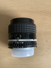 Nikon Series E 1:2.8 / 100 mm Objektiv Festbrennweite gebraucht defekt chromring