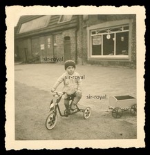 Child on Tricycle with