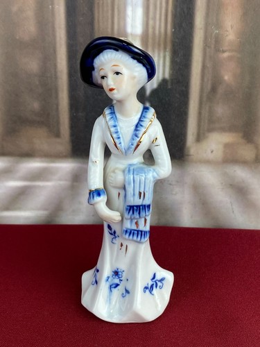Figur aus porzellan teils - figur,