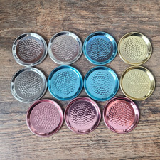 11 Stück Untersetzer Metall