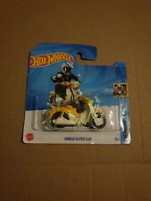 HOT WHEELS 2023 MOTO HONDA SUPER CUB IN YELLOW AND WHITE  SHORT CARD