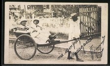 Foto-AK Rikscha mit Männern