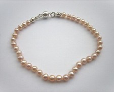 SWZ Perle Armband 19,5 cm lachsfarben geknotet 925 Silber Magnet-Schließe