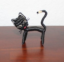 Katze aus Bast gefertigt, Kult
