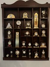 23 Miniatur Uhren aus Messing im Setzkasten