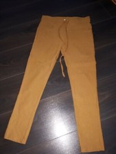 Hose, Senf, gelb-braun, vorne mit Rissen, Gr. 32