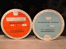 2x alte Rechenscheibe