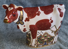Royal Crown Derby Briefbeschwerer Gänseblümchen Kuh mit goldenem Stopper. 