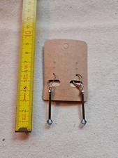 Ohrringe mit hellgrünen Swarovski-Biconen, 30 mm lang