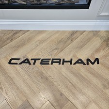 Caterham Schrift Stil großes
