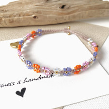 Makramée  Armband m. Blümchen aus Miyukiperlen / orange - Mix & gold / Edelstahl