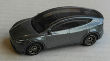Matchbox Tesla Model Y graumetallic MBX Mattel Elektroauto SUV Auto Car PKW grey