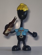 Biege Figur mit EKU Brauerei Bierwerbung