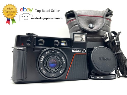 Neuwertig mit riemen nikon - *neuwertig, riemen*