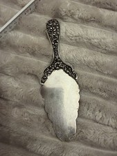 Antike Gebäckheber im