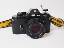 Nikon EM Kamera + Nikon Nikkor