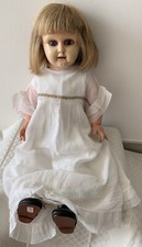 Frühe Celluloidpuppe auf Lederkörper