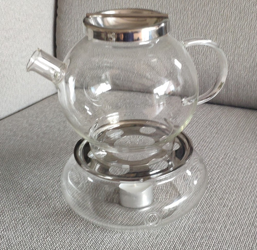 Glas teekanne mit - mit, stövchen