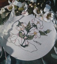 Stickvorlage, Kreuzstich  aus Handarbeitsheft, A5,  "  Mädchen mit Christrose  "