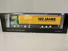 Herpa/AWM IVECO Stralis Gardinenplanen Sattelzug „GARTNER 102 Jahre“