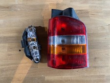 VW T5 Rückleuchte Rückscheinwerfer links mit Lampenträger / 7H0 945 095 J