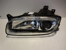 Mazda 323F Scheinwerfer links