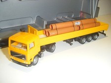 Herpa Volvo F12 Sattelzug mit Ladung Rohre in gelb