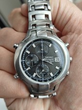 Seiko Chronograph 7T32 Vintage Armbanduhr dunkel graues Zifferblatt