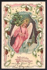 Präge-AK Weihnachtsengel mit einem Weihnachtsbaum, Tannenzweig-Rahmen 