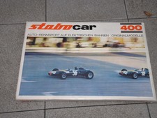 Stabo Car Rennbahn 400 Komplett mit Ferrari und Brabham und Brückenüberfahrt