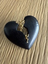 Ebenholz Herz Goldfiguren und