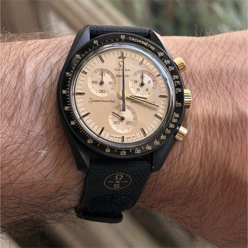 Swatch omega mission the - x, to