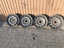 4xkomplette Felgen+4xNeu Gummiventile 14X5,5J ET:37 für Ford Fiesta,KA,Freestyle