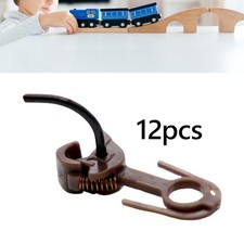 12x Modelleisenbahn-Kupplungen