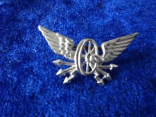 A28-06) Collar? Hat badge