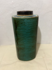 Große grüne zylinderförmige