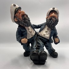 Two statues of sea captains