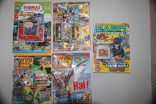 Fünf Comics mit Beilage (Willi wills Wissen, Card Master, Game-Magazin)