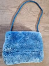 Warmer Muff aus Kunstpelz, Sehr gut erhalten,hellblau mit Kordel ca.28x13 cm