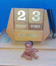 Miniatur, Baby sitzend