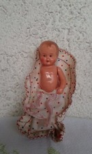 Christkind in Bettdecke