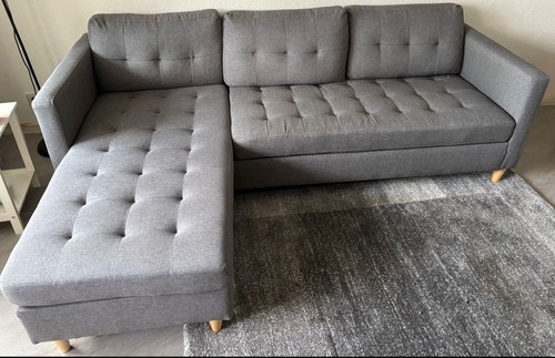 Couch grau - in,