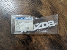 Mazda 323 626Front Grill-Emblem  P/N8173-51-771