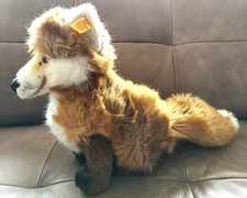 Steiff "Fuchs" sitzend, ca. 28 x 24 cm,  mit Knopf und Fahne 2892/28