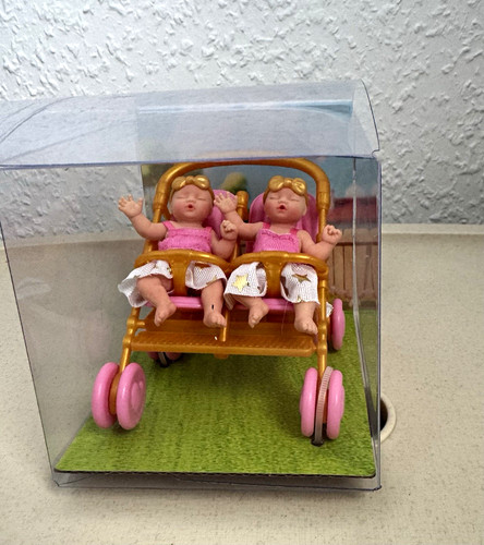 Miniatur-Kinderwagen