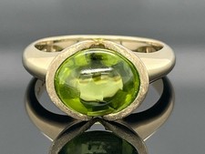 RING GR. 17 (CA. 53) AUS 375/-GELBGOLD MIT PERIDOT SOGNI D'ORO  SCHMUCKJAGD