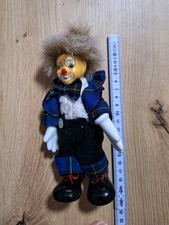 Figur Clown Porzellan ca. 18 cm . Stehend und sitzend