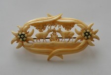 Handgeschnitzte Hirschhorn Brosche mit Edelweiß und Steinböcken