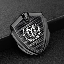 Kotflügel Emblem Mansory