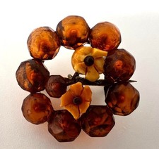 Antike Bernsteinbrosche mit